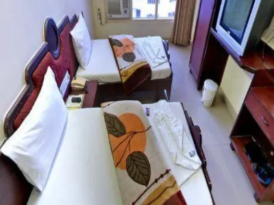 Hotel Alpha, Vadodara Отели в г. 
