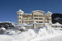 Traumhotel Alpina Superior Adults Only Hotel Mit Badeteich Hotele w: Wald im Pinzgau