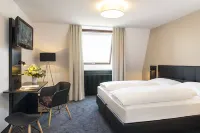 Victor's Residenz-Hotel München فنادق في UnterschleiBheim