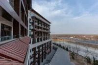 Qihe Peacock King Hot Spring Hotel - วิว