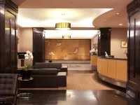 Carmana Hotel & Suites Hotels near Inukshuk