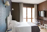 Hospedium Hostal Un Punto Chic Hotels near Gran Itinere