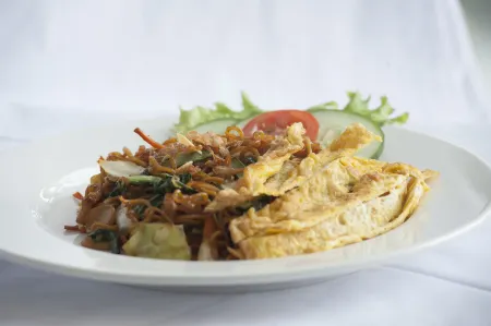 Genio Hotel Manado Отели в г. Wenang