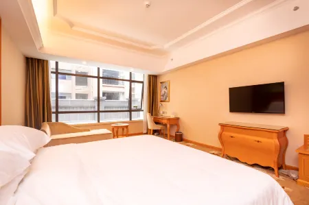 Vienna Hotel Отели в г. Шисин