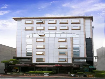 Happiness Hotel Отели рядом с достопримечательностью «Ri Xing Type Foundry»