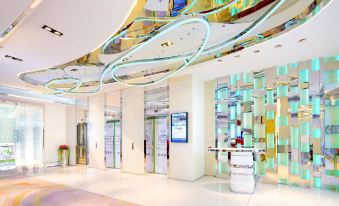 The building has a lobby and entrance with large windows on both sides, which lead into another area at iclub To Kwa Wan Hotel