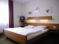 KRONE Hotels near Main riverbank