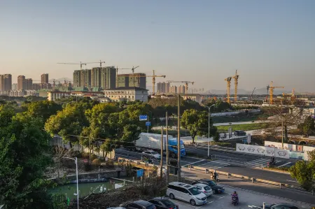 Changxing Xindu Business Hotel Отели рядом с достопримечательностью «Changxingxian Mountain»