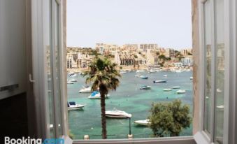 Blue Harbour 3 Bedroom Seafront Apartment with Large Yard on the Promenade - by Getawaysmalta