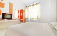 Wisma Rainbow Pekanbaru Hoteles en Senapelan