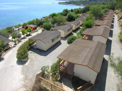 Villaggio Marinella Direttamente Sul Mare Hotels near Torre di Capo Nao