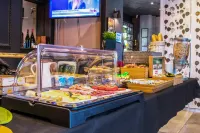 阿克圖爾尚貝利中心舒適飯店 - 早餐