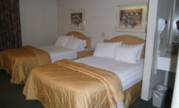 Pleasant Stay Inn & Suites - Housity