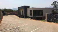 The Executive - Exclusive Self-Catering Apartments - Ezulwini Hoteles cerca de King Sobhuza II Memorial Park