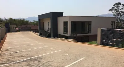 The Executive - Exclusive Self-Catering Apartments - Ezulwini Hoteles cerca de King Sobhuza II Memorial Park