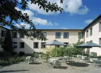 First Hotel Brommaplan Hotels near Telia