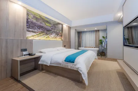 Guiyang Road Mingbuyi Hotel (Huaxi District Government Center Huaxi Park Branch) Отели рядом с достопримечательностью «Confucious Academy»