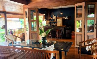 Riverhouse Hotel (The Teak House)