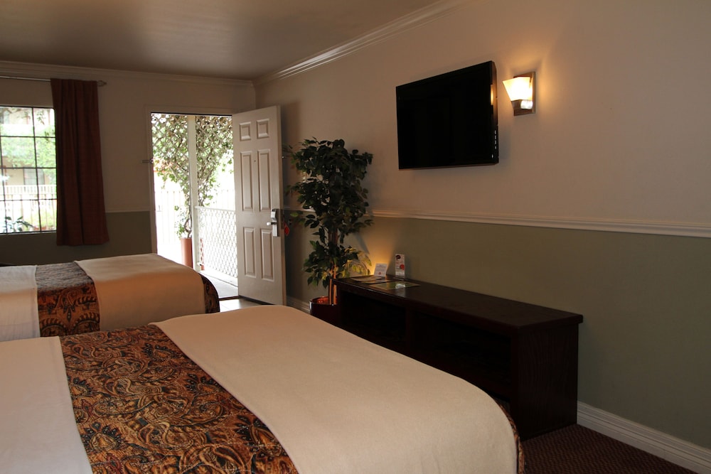 Family Garden Inn & Suites