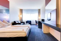Novina Hotel Herzogenaurach Herzo-Base Отели рядом с достопримечательностью «Stammhaus Dassler»