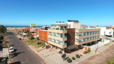 Pousada Molhes da Barra Отели в г. Торрес