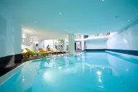 Golfhotel les Hauts de Gstaad & Spa فنادق في Jaun