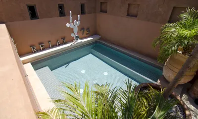 Riad Dar 73 Hotel dekat Badi Palace