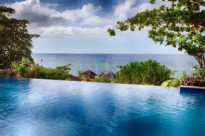Amun Ini Beach Resort & Spa Hotels near RAJ Shopping Center