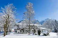 Stoll's Hotel Alpina Отели рядом с достопримечательностью «Bayerische Seenschifffahrt am Koenigssee»