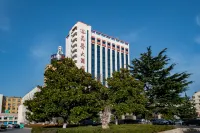 Kunyu Hotel Отели рядом с достопримечательностью «Shandong Wendeng Normal School (East to Wendeng Red Cross Hospital Xuefu Community Service Station)»