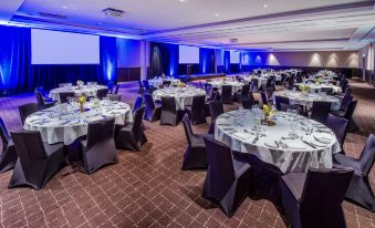 The ballroom at Hotel Belvedere is a popular venue for weddings, as shown in a photo taken by the estate of Person S at Rydges Resort Hunter Valley, an EVT hotel