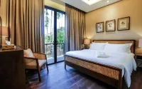 Balai Adlao Hoteles cerca de Nacpan Beach