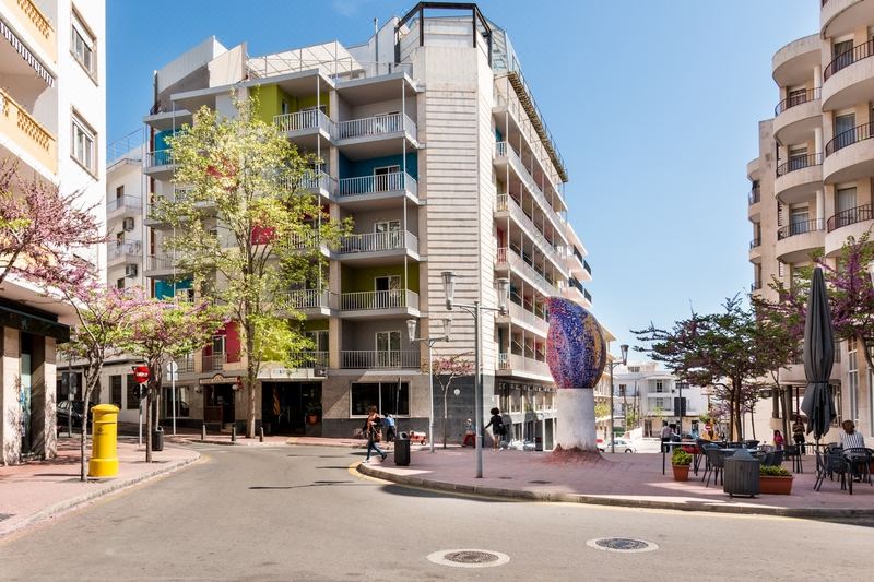 "a modern , multi - story building with balconies and a sign that says "" casa de los marineros ""." at Artiem Capri