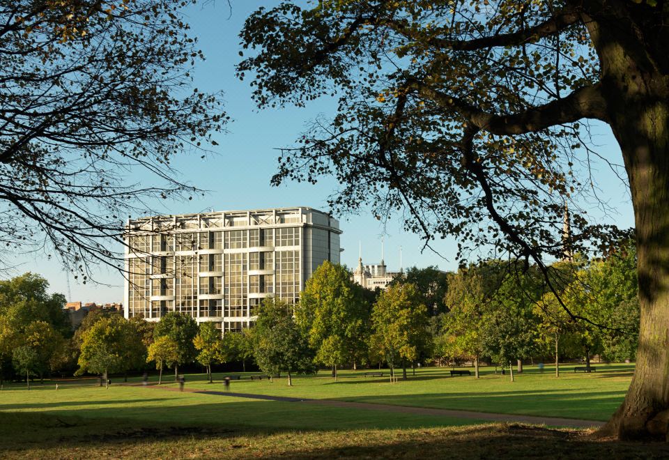 "A large building with trees in front has the words ""I love my life"" written on it" at Royal Garden Hotel