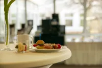 H+ Hotel Leipzig-Halle by Sunday Hotels - Aamiainen
