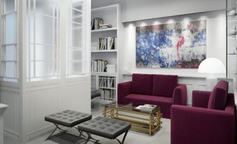 a modern living room with white walls , a large window , and purple sofas and coffee table at Palazzo Castri 1874 Hotel & Spa