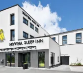 Novina Sleep Inn Herzogenaurach Отели рядом с достопримечательностью «Stammhaus Dassler»