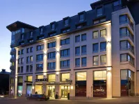 Sofitel Brussels Europe Отели рядом с достопримечательностью «Аббатство Камбр»