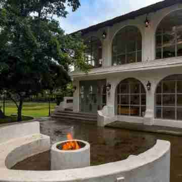 StayVista's Casa Blanca - Modern Elegance with a Pool, Spacious Lawn & Diverse Activities Hotel Exterior