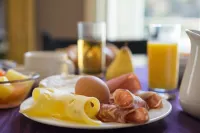 The Originals Boutique Hôtel Terminus Bourg-en-Bresse Gare - petit déjeuner