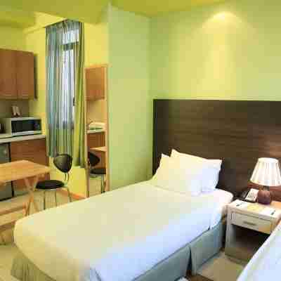 信實公寓酒店 Rooms