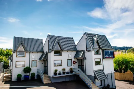 Aria on Bank Dunedin Отели в г. Данидин