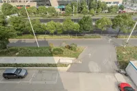 New Era Business Hotel (Anqing Wuyue Plaza Branch) - Bãi đậu xe