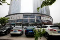Weilan Xinshe Hotel (Shilaoren Beach Miaoling Road Subway Station) - Bãi đậu xe