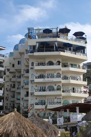Blue Chairs Beachfront Resort Puerto Vallarta - Adults Only Отели рядом с достопримечательностью «Los Muertos Beach Pier»