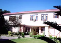 The Fern Surya Resort Kasauli Hills, Dharampur Hotels near North end of abandoned original Barog Railway Tunnel