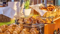 Holiday Inn München Süd - servizio colazione
