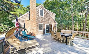 Cape Cod Home in The Trees by RedAwning