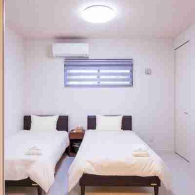 Kariyushi Condominium Resort Nago RBvilla Rooms