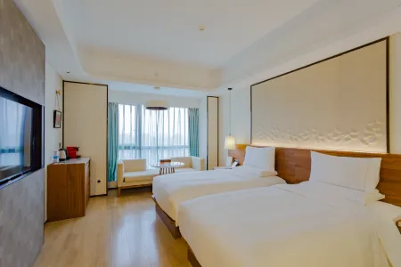 Grand Kingtown S Hotel Отели рядом с достопримечательностью «Tiexiang Temple»